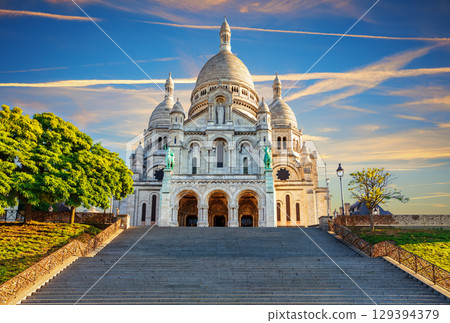 Basilica of the Sacred Heart in Montmartre, Paris, beautiful front sunset view 129394379