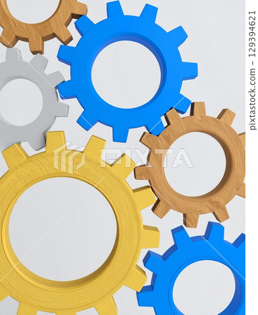 Gears made of different materials and shapes, such as wood, glass, and metal 129394621