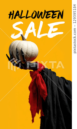 Skeletal hand in black cloak holds white pumpkin against bright yellow background, promoting Halloween sale 129395184