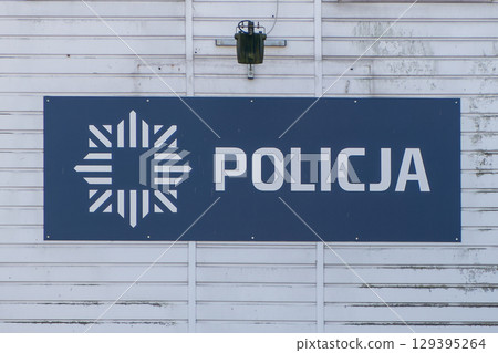 Poland, Krakow, police sign on the police station along the Vistula River Poland, Krakow, police sign on the police station along the Vistula River 129395264