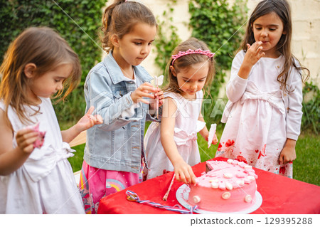 Birthday celebration fun with friends outdoors 129395288