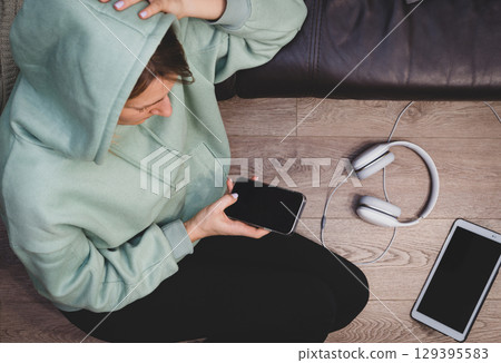 woman lying on the floor woman lying on the floor 129395583