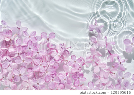 Abstract background with water and flowers. Space for the text. Abstract background with water and flowers. Space for the text. 129395616