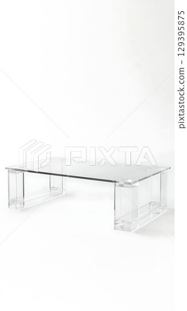 A clear glass table with a white background 129395875