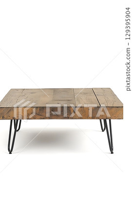 A wooden coffee table with black legs 129395904