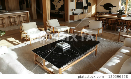 Large living room with a black coffee table and white chairs Large living room with a black coffee table and white chairs 129396558
