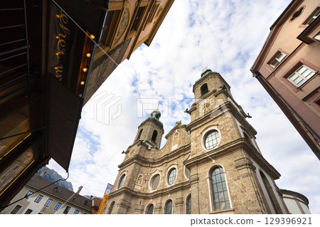 a view upwards between the old buildings in Innsbruck, Austria 129396921