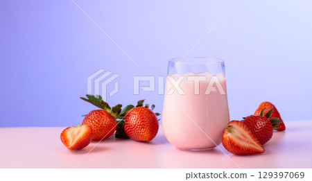 Strawberry yogurt and fresh berries on a colorful background. 129397069