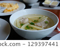 chicken broth with meatballs Bowl of instant noodles isolated on white background. 129397441