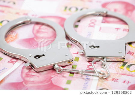 Handcuffs Chinese Yuan Handcuffs Chinese Yuan 129398802