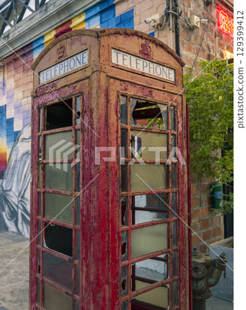 Red telephone booth sculpture at Srinakarin Railway Market, Bangkok / Bangkok, Thailand Red telephone booth sculpture at Srinakarin Railway Market, Bangkok / Bangkok, Thailand 129399412