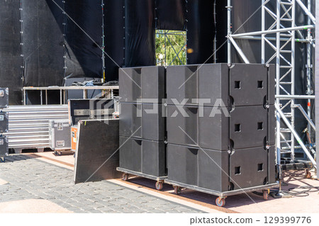 Professional acoustic systems prepared for installation on a modern concert stage 129399776