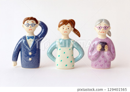 Three troubled characters (man, woman, senior woman) 129401565