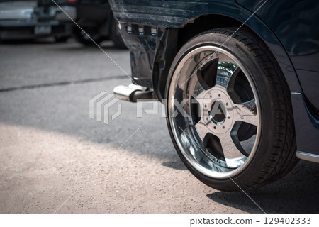 Checking car body work fiber bumper at car garage Checking car body work fiber bumper at car garage 129402333