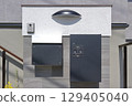 Delivery box installed at the entrance of a house 129405040