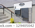 Delivery box installed at the entrance of a house 129405042