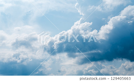 Cumulonimbus clouds appear in the midsummer blue sky Cumulonimbus clouds appear in the midsummer blue sky 129405663