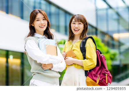 College students standing on campus 129405935