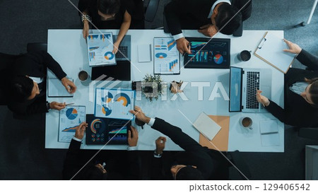 Top view of business people discussing about financial strategy. Directorate. 129406542