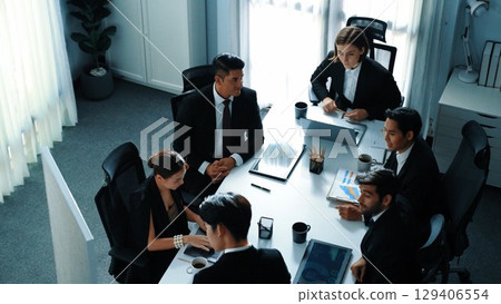 Businessman present idea while investor raise hand to ask question. Directorate. 129406554