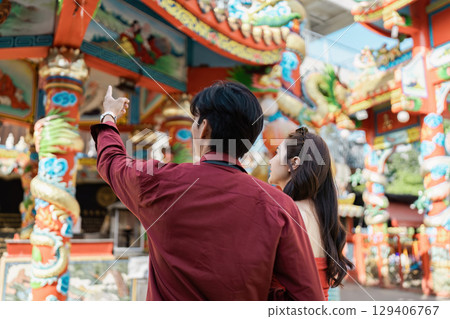 Festive Chinese New Year Travel Adventure with Vibrant Decorations and Cultural Celebrations Festive Chinese New Year Travel Adventure with Vibrant Decorations and Cultural Celebrations 129406767