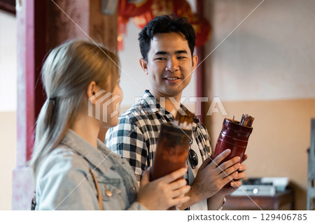 Cultural travel experience engaging conversations in a local market city indoor personal connection 129406785