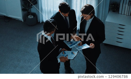 Top view of businessman handed out financial paper to manager. Directorate. Top view of businessman handed out financial paper to manager. Directorate. 129406786