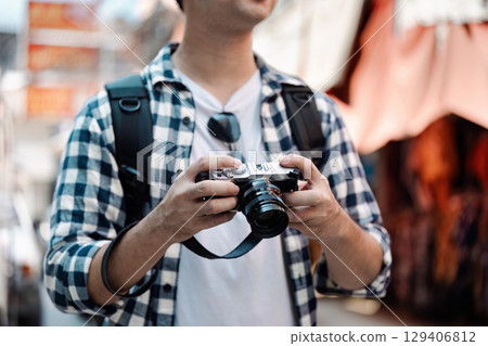 Travel adventure exploring vibrant markets city streets journey urban culture first-person perspective travel inspiration 129406812