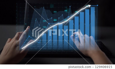 Hands typing on laptop with digital data chart illustrating growth, technology, finance, investment, analysis, and business strategy in workspace environment Copula 129406915