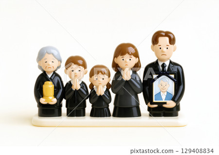 Family at the funeral 129408834