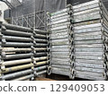 Temporary scaffolding used for large-scale repair work on an apartment building 129409053