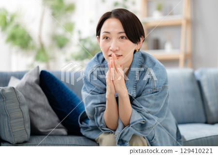 Woman obsessed with TV Woman obsessed with TV 129410221