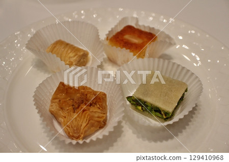 Assorted Middle Eastern desserts at a restaurant in Doha, Qatar Assorted Middle Eastern desserts at a restaurant in Doha, Qatar 129410968
