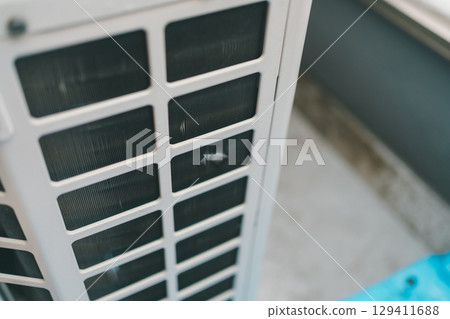 Dents in the aluminum fins of the air conditioner outdoor unit Dents in the aluminum fins of the air conditioner outdoor unit 129411688