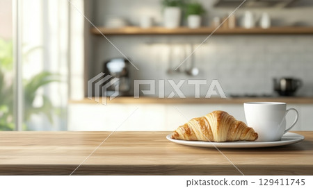 delicious croissant and coffee on wooden kitchen counter delicious croissant and coffee on wooden kitchen counter 129411745
