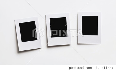 three blank polaroid frames on white background 129411825