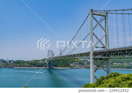 [Fukuoka Prefecture] Kanmon Strait, Kanmon Bridge, and ships passing by on a clear day as seen from Mekari PA 129412932