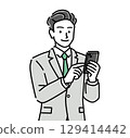 A male businessman operating a smartphone 129414442