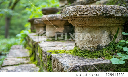 Ancient stone steps cloaked in moss. 129415531