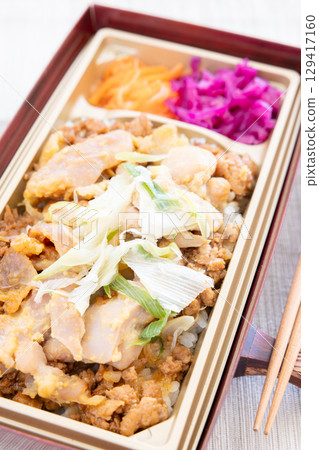 Delicious domestically raised chicken Nishikyo-yaki minced meat bento 129417160