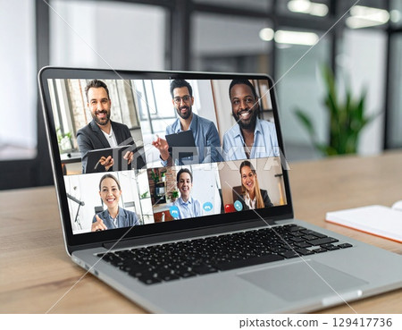 Business team video conference on laptop screen with multiple participants in gallery view 129417736
