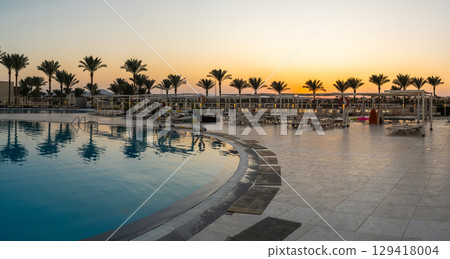 Sunset at Marsa Alam Resort Swimming Pool in Egypt 129418004