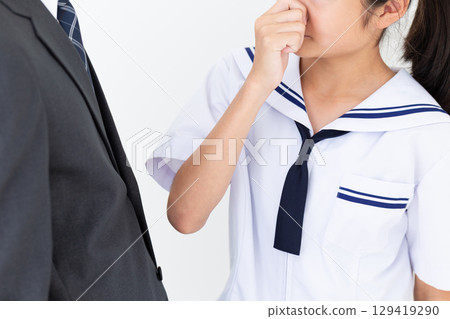 A middle school girl in a school uniform who hates her father's smell A middle school girl in a school uniform who hates her father's smell 129419290
