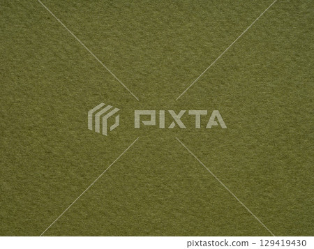 The texture of this olive green paper surface captures the essence of nature's own canvas 129419430