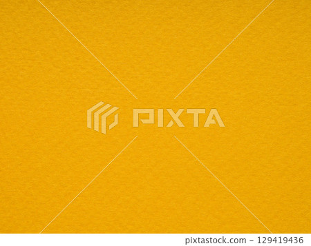 The rich golden hue of this paper texture feels like a warm embrace on a crisp fall morning The rich golden hue of this paper texture feels like a warm embrace on a crisp fall morning 129419436
