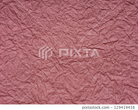 A symphony of roseate folds, the paper's texture whispers tales of grace and aged elegance 129419438