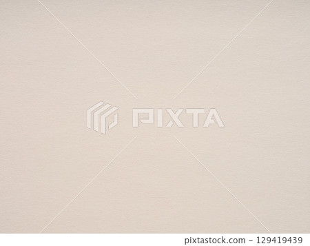 Warm beige tones on textured paper evoke a cozy, inviting feel, perfect for creative thoughts and artistic musings 129419439