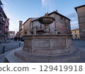 g Piazza dei Consoli, the elongated central square of Deruta in Umbria.  129419918