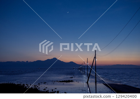 Nagabeda Seaside Road and the moon as dusk approaches 129420400