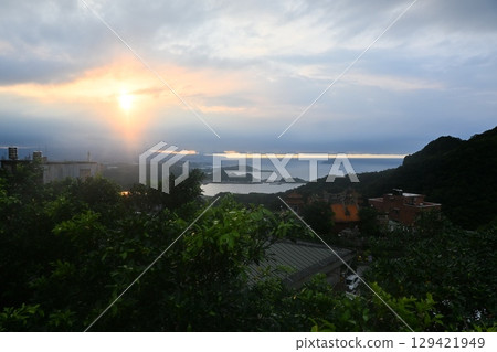 Sunset over the sea 129421949